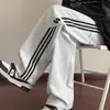 Pantalones de chándal anchos con estampado de letras retro americano y tres rayas para hombre y mujer, marca de moda, holgados, casual, deportivos, versátiles, largos