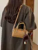 Bolsa Boston estilosa e versátil para mulheres, nova coleção 2026, com um toque de luxo, adequada para o trabalho, para o dia a dia e pode ser carregada como bolsa de mão, bolsa transversal ou bolsa de ombro