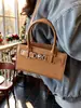 Bolso de Mano Pequeño Elegante Nuevo Estilo Invierno 2026 Transfronterizo para Mujer, Bolso de Hombro Versátil con un Toque de Alta Gama, Bolso Cruzado Casual