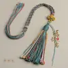Cuerda de juego para colgar en el coche tejida a mano Xizang hilo de algodón cordón hilo de algodón frotado a mano borla Thangka nudo Wenchang cordón antiguo