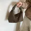 Bolso transfronterizo para mujer, bolso de hombro de moda y tendencia para el día a día, bolso de axila, bolso para lonchera, nuevo bolso tejido versátil y cómodo 2026