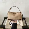 Bolso tipo almohada de cuero suave de alta gama, súper popular, estilo coreano, para mujer, nueva moda 2026, versátil, de gran capacidad, para hombro y cruzado