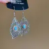Brincos Ovais de Turquesa com Pingente de Borla e Recorte de Folha Estilo Étnico Retrô Brincos de Luxo Acessível Brincos de Alta Qualidade