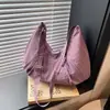 Bolsa de Tecido com Zíper para Pendurar no Ombro de Grande Capacidade para Deslocamento Bolsa Grande 2025 Nova Bolsa de Ombro Leve e Versátil Bolsa Tote Simples Transversal Moderna
