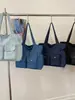 Bolso de lona de mezclilla de gran capacidad para mujer, nuevo modelo 2026, bolso de mano de viaje práctico con múltiples bolsillos, bolso de hombro para el trabajo