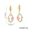 Europa y Estados Unidos moda transfronteriza ojo de diablo palma pendiente de gota de oreja modelado personalidad hermoso hip-hop temperamento aretes de clip para oreja venta al por mayor