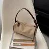 Nuevo bolso de moda de nicho esmerilado 2026 para debajo del brazo, bolso de mano retro de alta gama, bolso cruzado versátil para el hombro para mujer