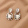 Pendientes Geométricos Simples de Moda Japonesa y Coreana de Venta Caliente Transfronteriza para Mujer, Pendientes de Moda Estilo Ins, Versátiles Pendientes de Piedra Ojo de Gato Estilo Hong Kong
