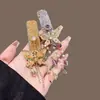 Horquilla de Mariposa con Borla de Diamantes Brillantes de Alta Resistencia Moda Dulce Nicho de Alto Valor Clip de Gato de Cristal Pinza Lateral para Flequillo