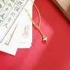 Collar de oro de arena de Vietnam diseño simple sensación con cuentas borla de amor cadena para la clavícula pequeño joyería de larga duración que no se decolora suministro