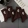 Meias Letra C Femininas Meia-Perna Outono e Inverno Quentes Modernas Celebridade da Internet Roupa Infravermelha Meias de Cano Alto Meias Esportivas Versáteis