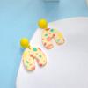 2023 Verano nuevos aretes lindos personalidad geométrico color macarrón aretes de cerámica suave gancho para la oreja aretes de mujer al por mayor