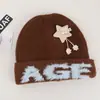 Gorro de pescador de lana tejida coreana, cálido para otoño e invierno, elegante para ir de compras, hace que tu cara se vea más pequeña, nuevo gorro con orejeras bordado