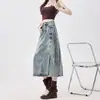 Falda de Mezclilla con Abertura para Mujer Verano 2025 Moderna Versátil Nuevo Estilo Borla Irregular de Línea A Falda Retro Ajustada a la Cadera