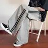 2026 Nuevo Estilo Americano Rayas Hielo Seda Secado Rápido Sentido del Diseño Verano Delgado Transpirable Holgado Casual Pantalones Largos