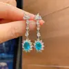 Europa y Estados Unidos populares en vivo color caliente tesoro color tesoro simulación micro incrustación pequeños frescos aretes aretes piedra principal 6*8