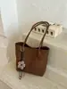 Bolsa casual estilosa de grande capacidade 2026 novo modelo bolsa de ombro casual bolsa de axila padrão trançado bolsa sacola para o dia a dia