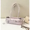 Bolsa de Braço com Laço para Mulheres 2026 Novo Modelo Luxo Leve Simples Versátil Bolsa de Ombro Elegante Bolsa de Mão para o Dia a Dia Bolsa Baguette