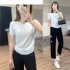 Tricô Simples de Alta Qualidade Preto e Branco em Triacetato! Ombro Quadrado Generoso Bainha Enrolada Emagrecimento Manga Curta Textura Fresca Camiseta Fina Verão