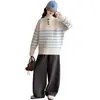 Suéter de Punto Rayado con Cuello Redondo para Niñas Otoño/Invierno 2026 Nuevo Estilo Ropa de Otoño para Niñas Grandes Tejido Elegante con Botones de Cuerno Versátil Moderno