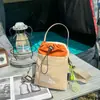 2026 Nueva Bolsa para Botella de Agua de Deportes al Aire Libre Hombres Mujeres Bloque de Color Cierre de Cordón Bolso Cruzado Estudiante Clase Portátil para Teléfono Moderno