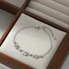 2026 Nuevo Estilo Joyería de Mano Personalizada Incrustada con Circonitas para Mujer, Pulsera Ajustable de Tira de Ojo de Gato de Alta Gama