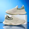 Zapatos Infantiles 2026 Verano Nuevos sin Cordones Transpirables Tejido de Malla Fly Knit Ligeros Unisex para Niños Zapatos Deportivos Casuales de Moda