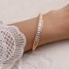 Pulsera de circonitas torcidas transfronterizas europeas y americanas, diseño de moda de lujo ligero, pulsera de alto sentido, pulsera popular de Amazon