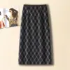 Elegante falda de sarga de lana para mujer, nueva colección otoño/invierno 2026, de cintura alta, estiliza la figura, elegante, falda de línea A de longitud media