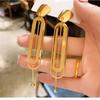 Europeu e Americano oco longo borla brincos moda vento frio design personalidade eardrop nicho brincos Coringa atacado