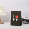 Bolsa de Papel Kraft Día de San Valentín Bolsa Tote Amor en stock Dibujos Animados Fiesta de Bodas Centro Comercial Mayorista Bolsa de Compras Bolsa de Regalo