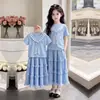 Moda Verano 2026 Conjunto de Dos Piezas a Rayas de Manga Corta Dulce y Lindo con Encaje para Niñas con Falda Larga