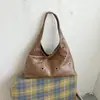 2026 Verano Diseño de Nicho Moda Bolso de Mano Casual Personalidad Bolso de Hombro Simple Moderno Anillo con Remaches Bolso para Mujer