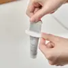 Suministro directo de fábrica 7039 clip de pasta de dientes 3 piezas de exprimidor de botellas de limpiador facial exprimidor multiusos clip de compresión de pasta de dientes para niños