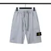 Shorts de Pedra Colorido Sólido Estilo Novo Europeu e Americano Transfronteiriço com Decoração de Bolso Grande Calças de Cinco Pontos para Homens e Mulheres