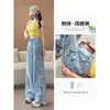Jeans rasgados estilo americano para mujer, súper populares para el verano 2026, talla petite, parche lateral, pantalones acampanados desgastados