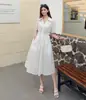 2026 - Vestido Largo Elegante de Alta Calidad con Cuello Solapa, Ceñido a la Cintura, Bordado Hueco, Sencillo y Elegante para Mujer, Vestido de Verano Nanyou