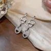 Brincos de zircônia com pino de prata e formato de nariz de porco, brincos de franja simples e versáteis da moda coreana, brincos de atacado de nicho de alta qualidade