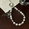 Correa de teléfono de lujo con nuevo lazo, llavero antipérdida, cordón para cámara, colgante de perlas, accesorio para bolso
