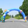 Arco inflable de dibujos animados ceremonia de apertura graduación de jardín de niños vacaciones modelo inflable actividad Puerta Arcoíris parque de atracciones Océano