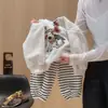 Conjunto de sudadera para niños, nueva colección primavera/otoño, moderno y a la moda, con un diseño de muñeca 3D en la sudadera y los pantalones, un conjunto de dos piezas para niños y niñas