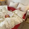 Juego de ropa de cama de cuatro piezas de algodón puro jacquard ultrasuave estilo coreano con borde de algodón rizado para niñas, juego de tres piezas para estudiantes