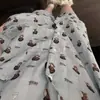 Pijama de niña de piel negra con dibujos animados, nuevo de celebridad de internet, conjunto de dibujos animados de manga corta y pantalón corto de verano, se puede usar fuera de casa