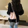 Bolso cubo único de cordón de nicho 2026 nuevo bolso cruzado versátil de moda para mujer bolso nube súper popular exquisito