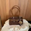Bolso de Mano de Moda Súper Caliente Transfronterizo Bolso de Hombro de Moda para Mujer Nuevo Estilo 2026 Lujo Ligero Versátil Sensación de Alta Gama Bolso de Hombro