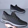 2026 Novo Modelo Malha Fly-Knit Respirável Sapatos Masculinos Versátil Esportivo Casual Solado Macio Antiderrapante Sapatos de Pai Meia-Idade Peça Única