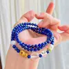 Pulseira estilo Ins com 4mm de lápis-lazúli natural e cristal branco, design multi-fios