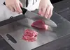 Esta es una tabla de cortar de acero inoxidable hecha de material 304, segura y saludable de usar.