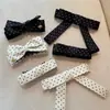 Presilha de Cabelo Estilo Coreano de Tecido com Bolinhas e Laço Clip Banana de Alta Qualidade Exquisite Clip para Nuca Clip Torcido Acessórios de Cabelo para Mulheres