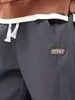 Pantalones de Chándal para Hombre Otoño e Invierno 2025 Nueva Marca de Tendencia Cargo Jogger Pantalones Deportivos Largos Casuales Harem con Forro Polar Negro